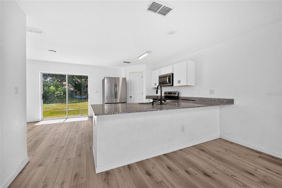 Furnished interior view inside a new home in , Port Charlotte (Image 18).