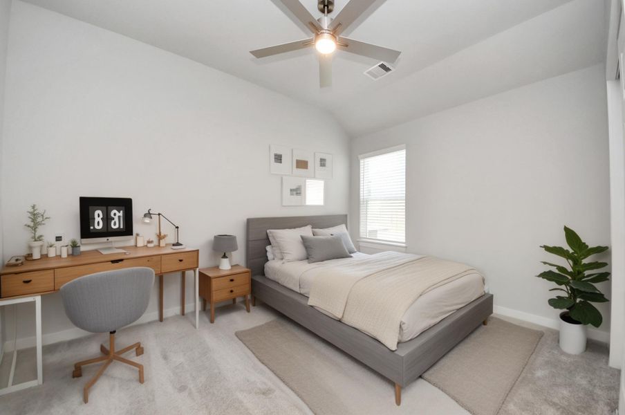 VS. Secondary bedroom features plush carpeting, large windows that let in plenty of natural light, bright paint, and spacious closets. Sample photo of completed home with similar floor plan. Actual colors and selections may vary.