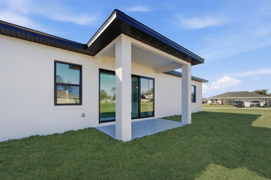 Exterior details and patio area of a home in , Ocala (Image 4).