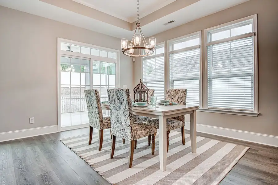 Representative furnished interior of a home built from the Torino by McKee Homes in The Cottages at 78 North, Sanford (Image 4).