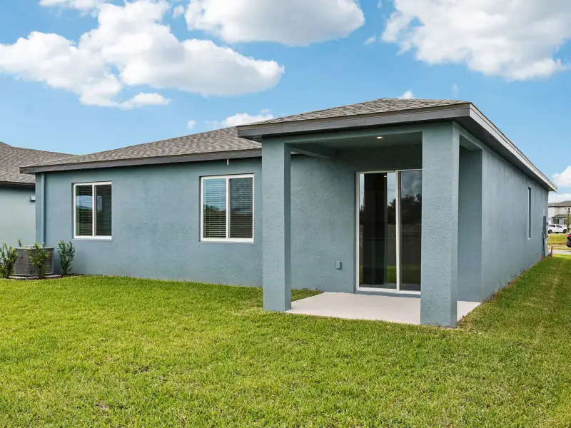 Exterior details and patio area of a home in Two Rivers - Classic Series, Zephyrhills (Image 3).