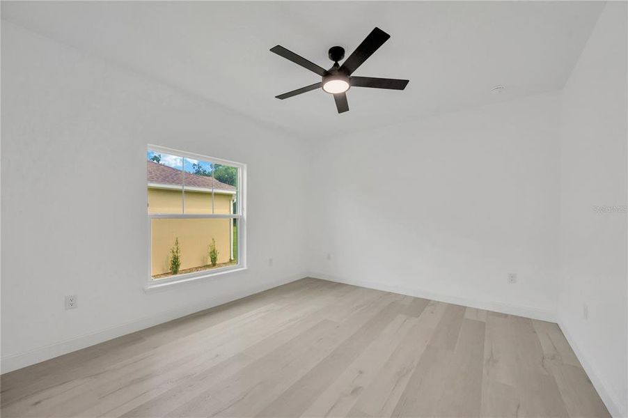 Spacious, unfurnished interior of a new home in , Dade City (Image 44).