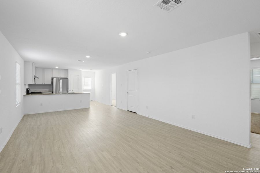 Spacious, unfurnished interior of a new home in Ruby Crossing: Cottage Collection, San Antonio (Image 11).
