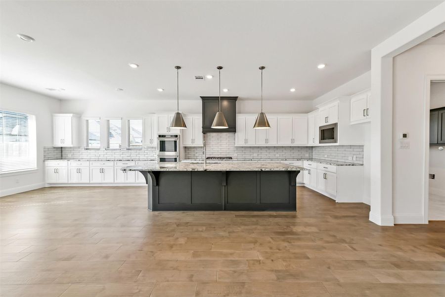 Furnished interior view inside a new home in , Manvel (Image 14).