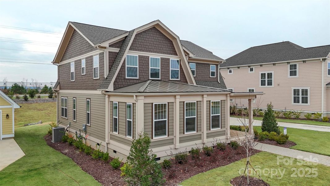 Front exterior of a new home in Riverwalk, Rock Hill, SC, highlighting curb appeal (Image 21).