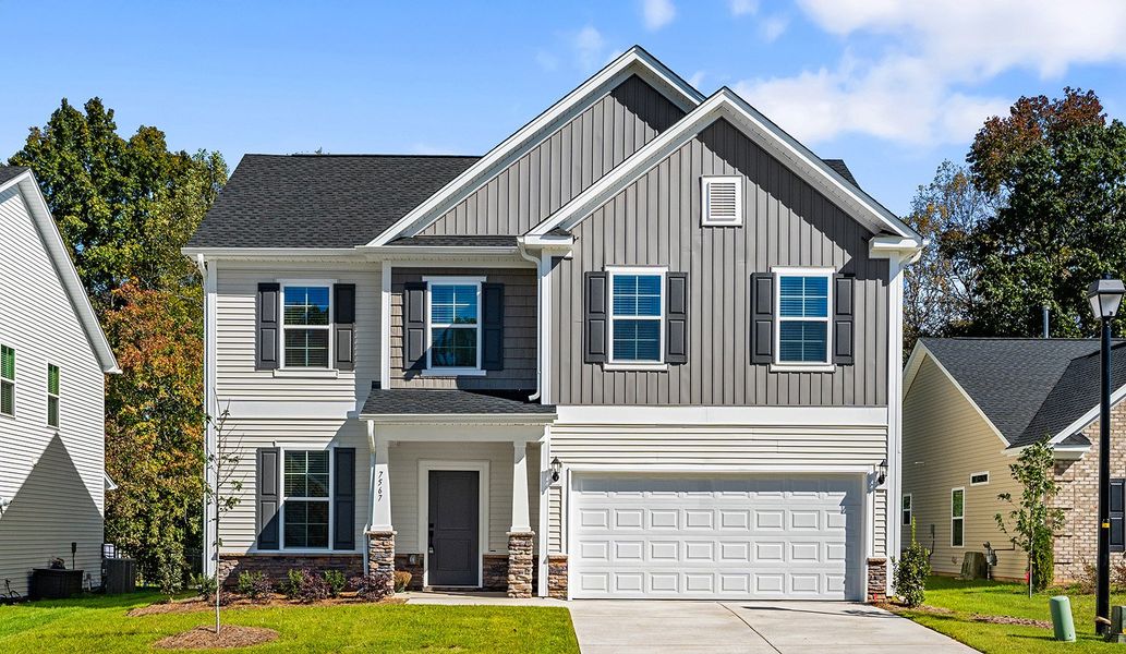 Front exterior of a new home in Watkins Landing, Kernersville, NC, highlighting curb appeal (Image 1).