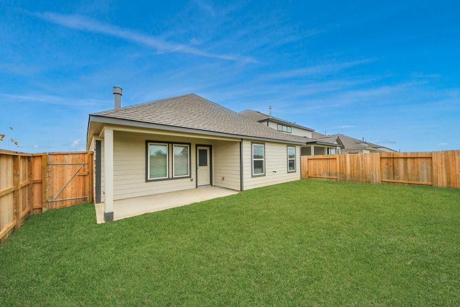 Backyard retreat, offering an abundance of space for kids to play and explore. The possibilities are endless in this outdoor haven, where the joy of open-air activities and family gatherings awaits.