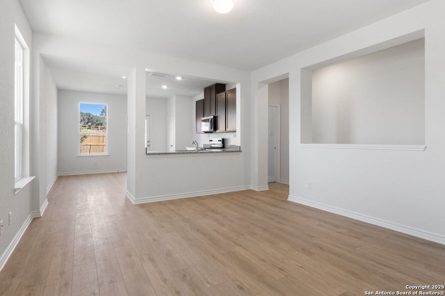 Spacious, unfurnished interior of a new home in Preserve at Culebra - Heritage Collection, San Antonio (Image 7).