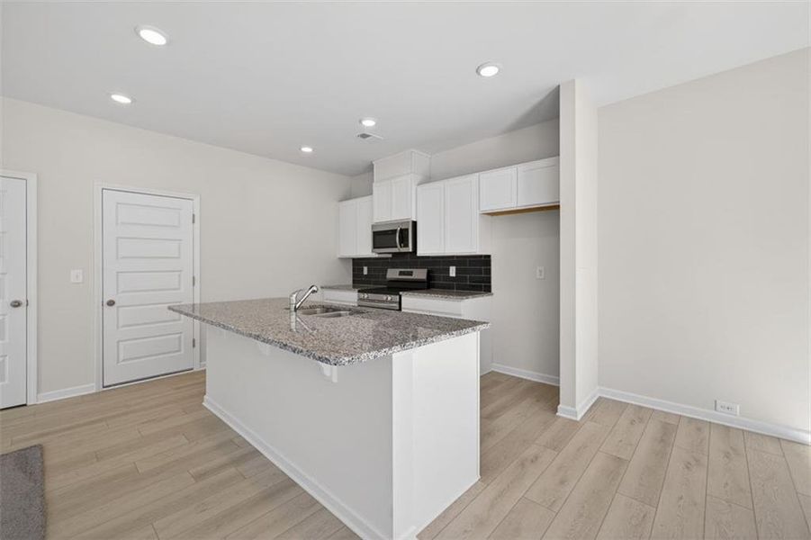 Furnished interior view inside a new home in Fuller Station, Loganville (Image 4). Furnished interior view inside a new home in Fuller Station, Loganville (Image 4).