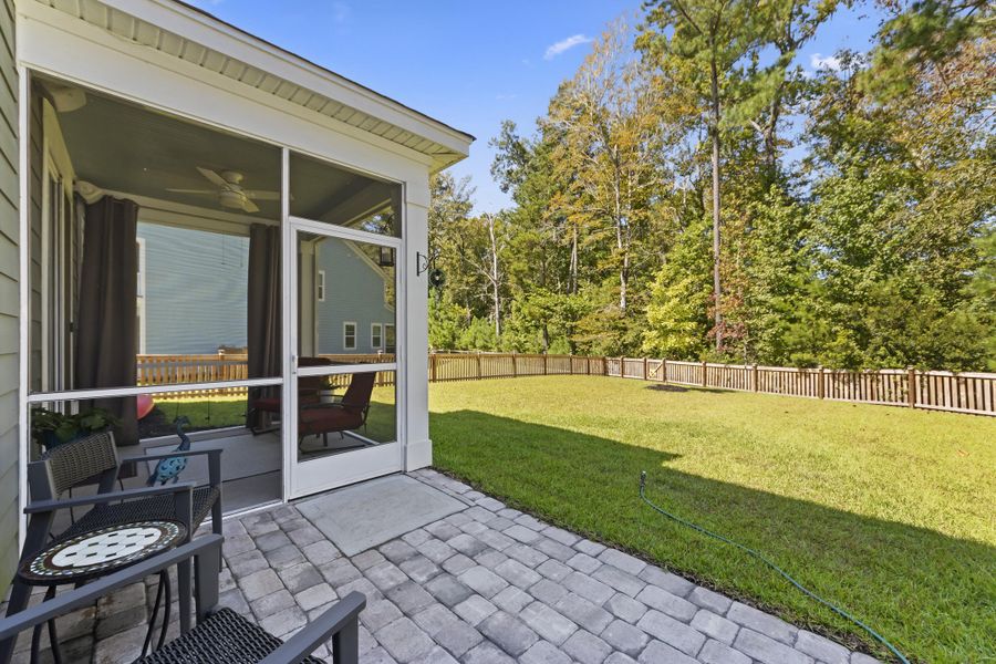 Front exterior of a new home in The Ponds, Summerville, SC, highlighting curb appeal (Image 23).