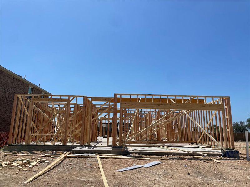 Front exterior of a new home in Berry Creek Highlands, Georgetown, TX, highlighting curb appeal (Image 16). Front exterior of a new home in Berry Creek Highlands, Georgetown, TX, highlighting curb appeal (Image 16).