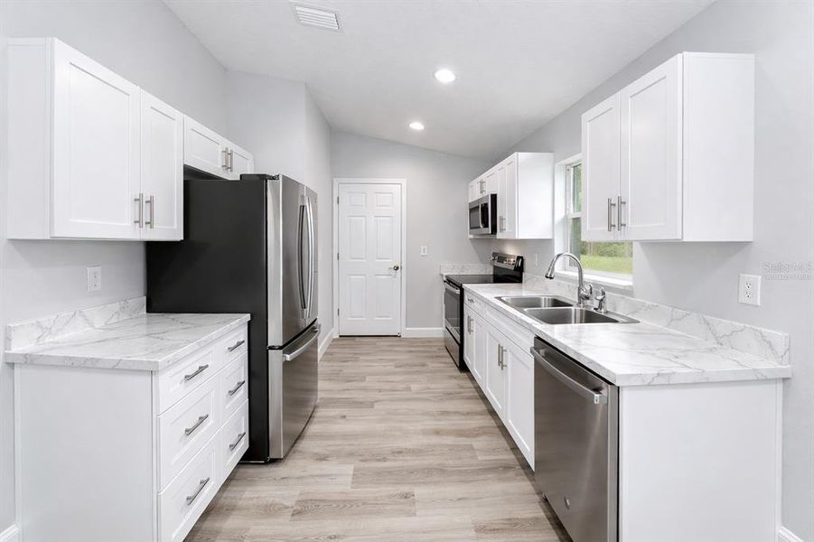Furnished interior view inside a new home in , Ocala (Image 11).