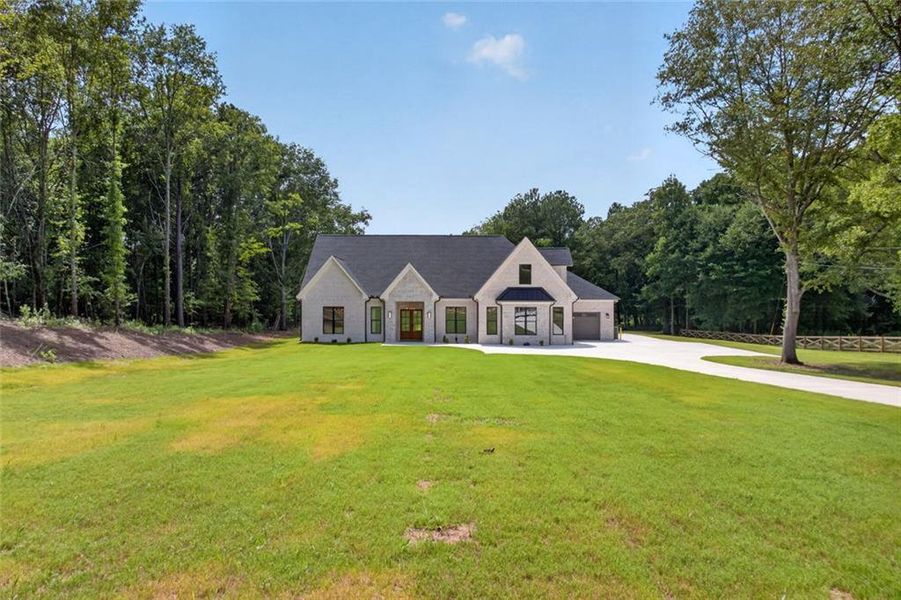 Front exterior of a new home in , Monroe, GA, highlighting curb appeal (Image 35). Front exterior of a new home in , Monroe, GA, highlighting curb appeal (Image 35).