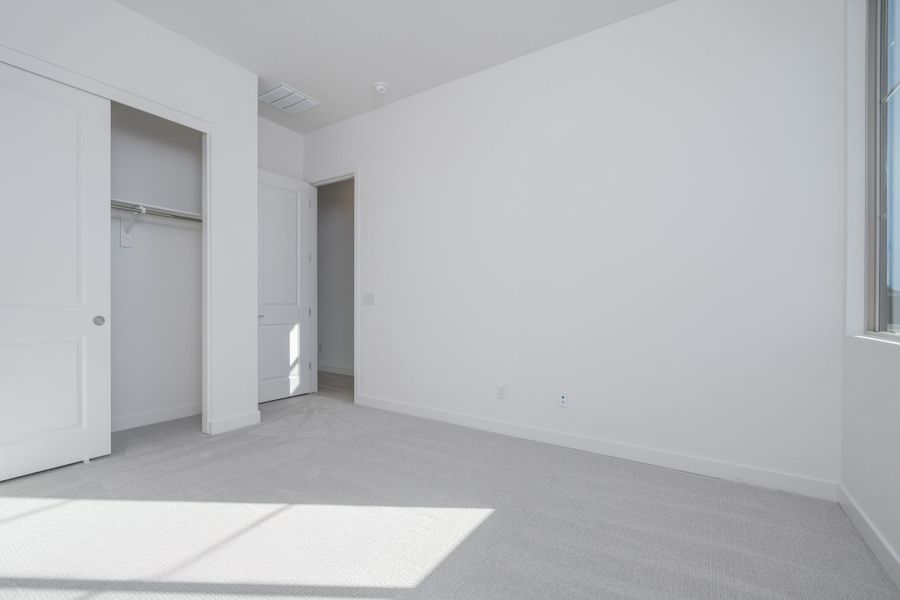 Spacious, unfurnished interior of a new home in Soleo, San Tan Valley (Image 14).