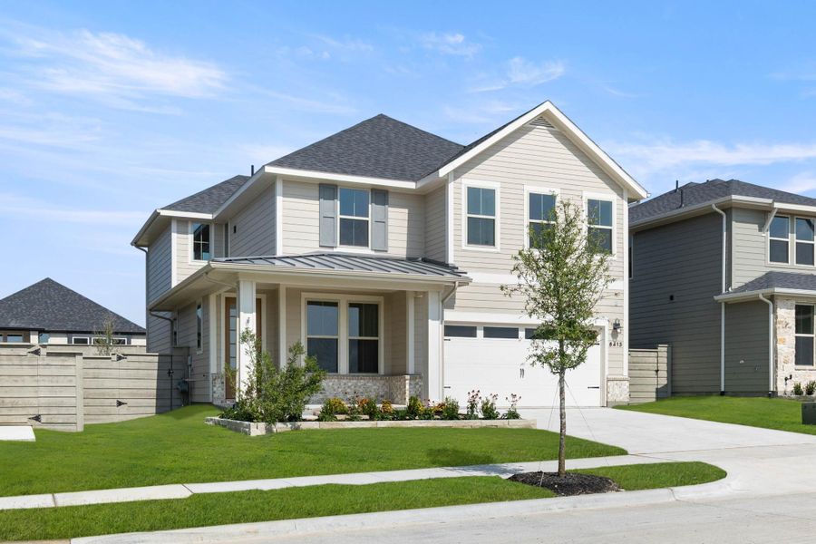 Front exterior of a new home in Treeline, Justin, TX, highlighting curb appeal (Image 2).