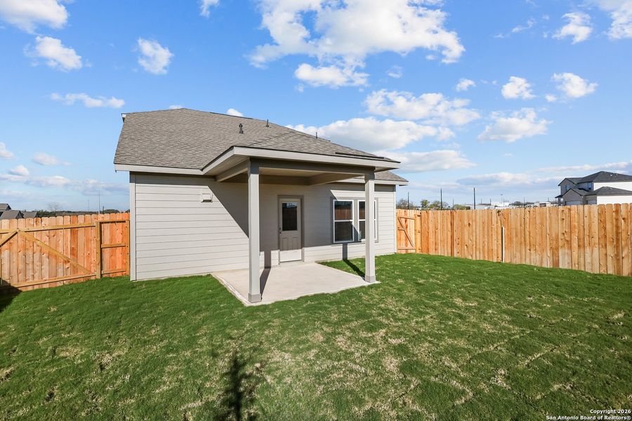 Exterior details and patio area of a home in Garden Grove, Schertz (Image 20).