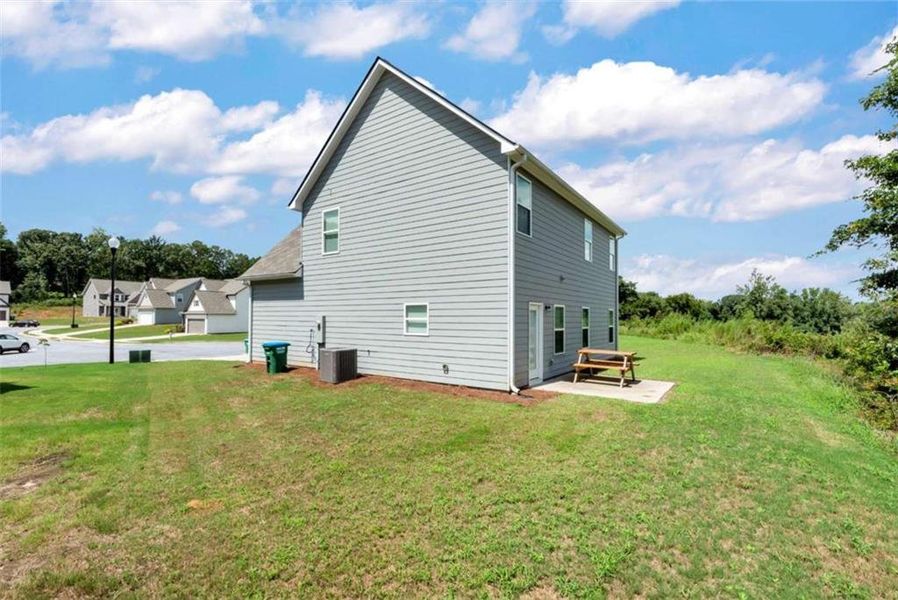 Front exterior of a new home in , Commerce, GA, highlighting curb appeal (Image 22).
