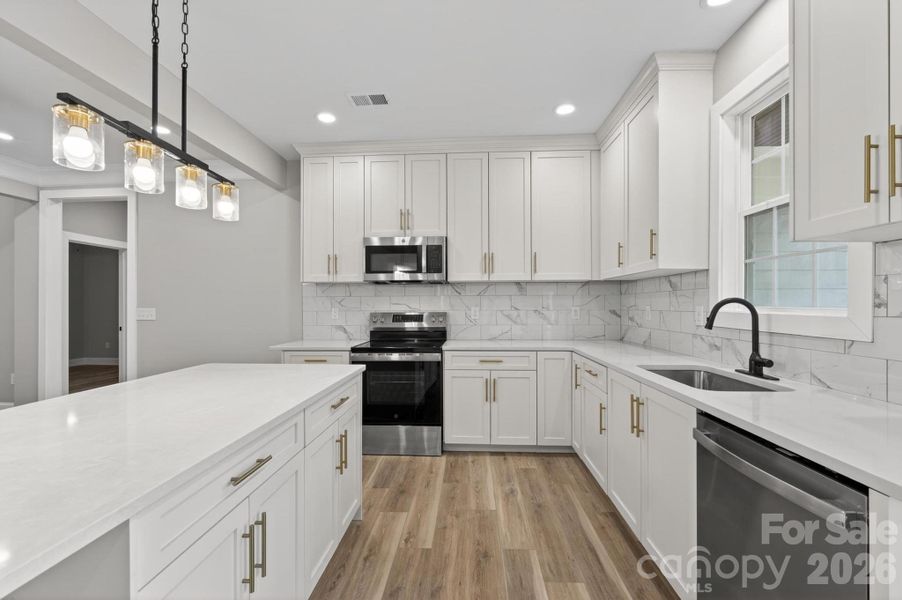 Furnished interior view inside a new home in , Lenoir (Image 12).