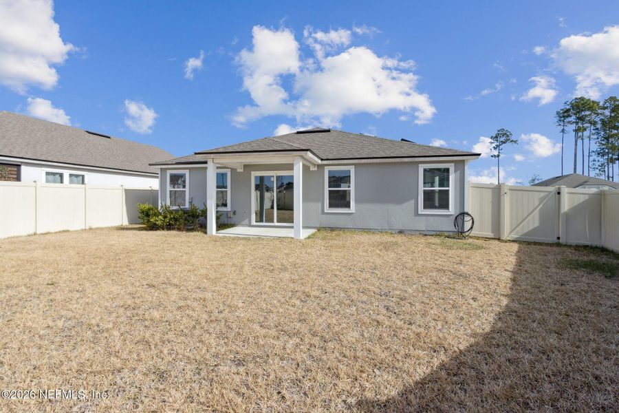 Exterior details and patio area of a home in , Yulee (Image 21).