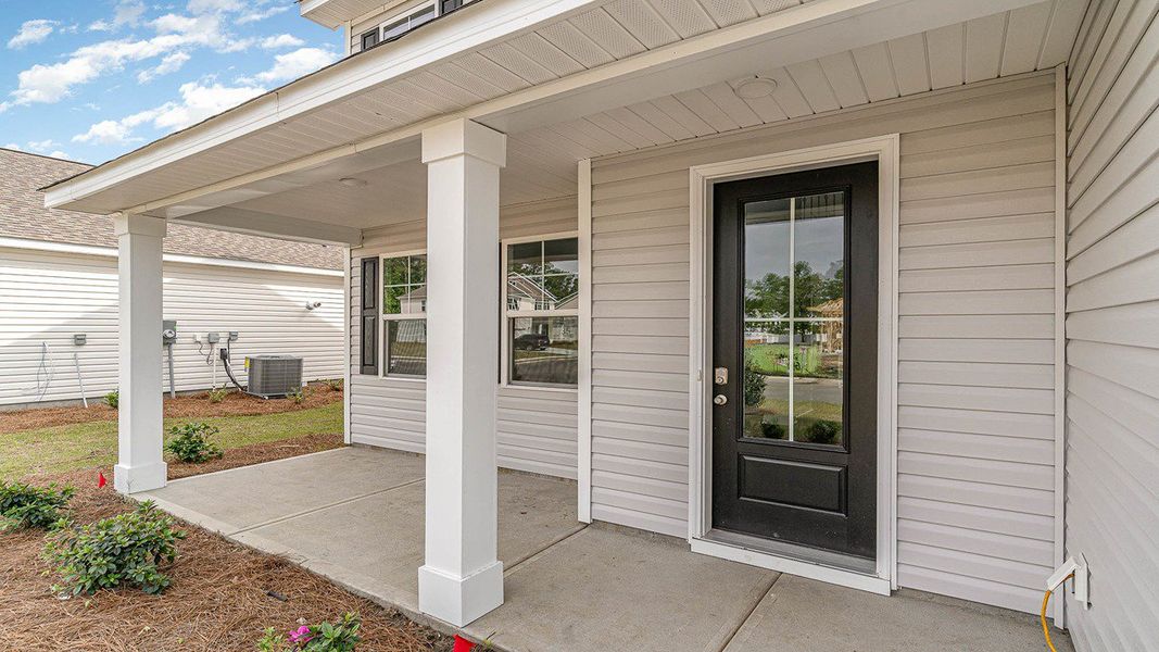 Representative exterior photo of a completed home built from the FORRESTER by D.R. Horton in Haven View, Murrells Inlet, SC (Image 18).