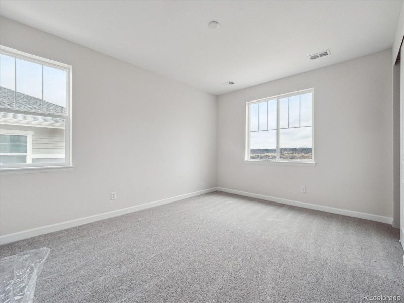 Spacious, unfurnished interior of a new home in Vista Pines at Crystal Valley, Castle Rock (Image 30).