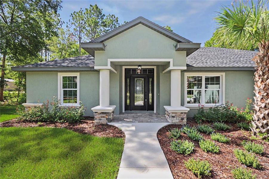 Front exterior of a new home in , Dunnellon, FL, highlighting curb appeal (Image 29).