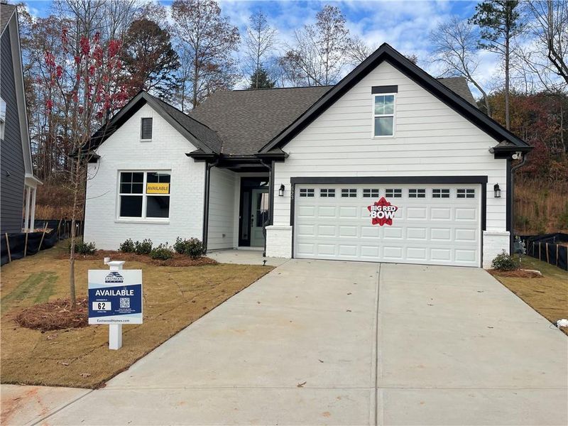 Front exterior of a new home in Marble Tree, Ball Ground, GA, highlighting curb appeal (Image 1).