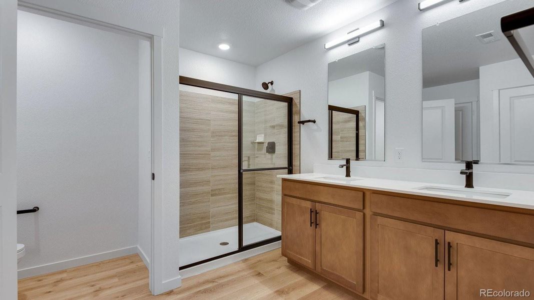 Furnished interior view inside a new home in Trails at Crowfoot, Parker (Image 6).