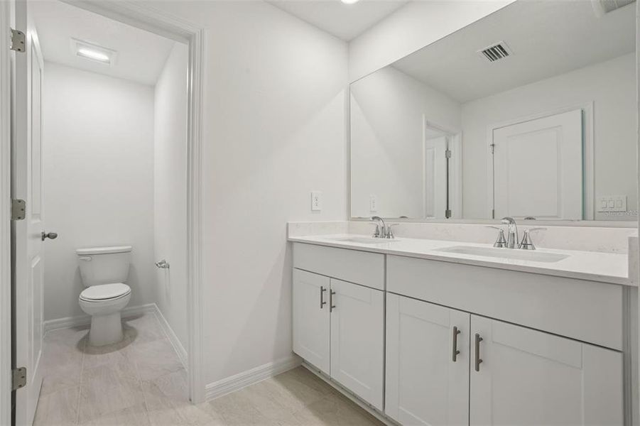 Furnished interior view inside a new home in Bradford Park, Ormond Beach (Image 9).