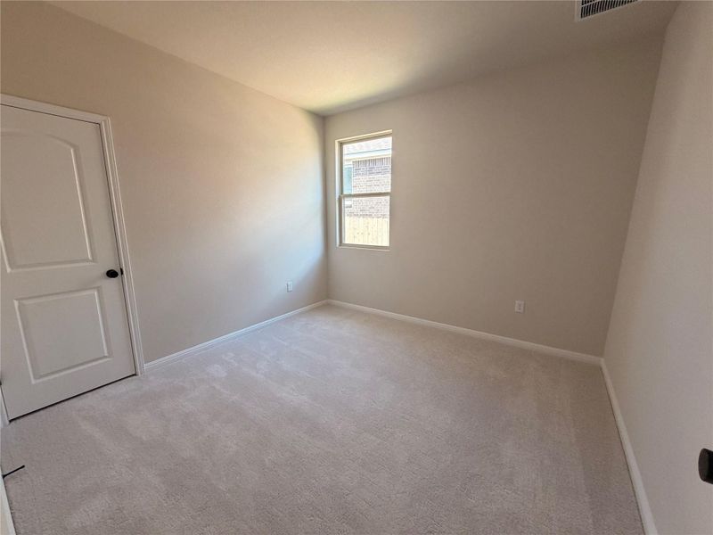 Spacious, unfurnished interior of a new home in The Colony, Bastrop (Image 14).