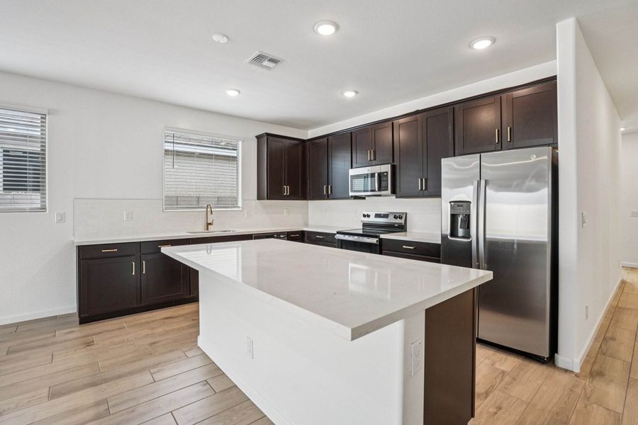 Kitchen featuring the Oxford Collection. Finishes and colors may vary by community.