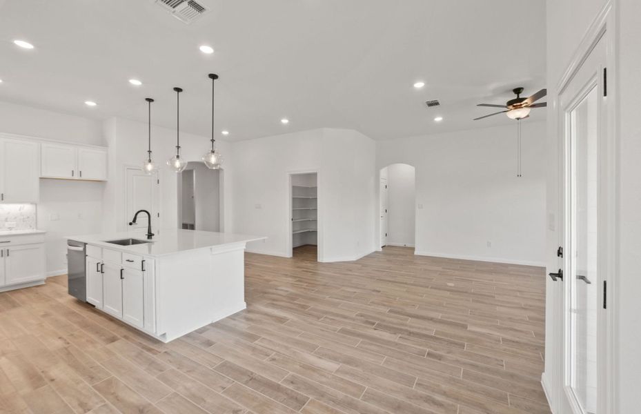 Representative unfurnished interior of a home built from the McKinney by Pulte Homes in Crescent Bluff, Georgetown (Image 10).