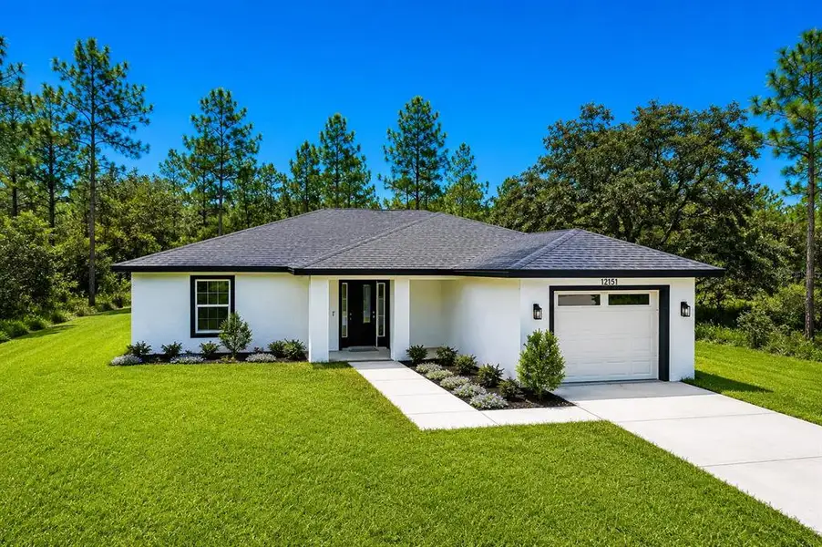 Front exterior of a new home in , Brooksville, FL, highlighting curb appeal (Image 27). Front exterior of a new home in , Brooksville, FL, highlighting curb appeal (Image 27).