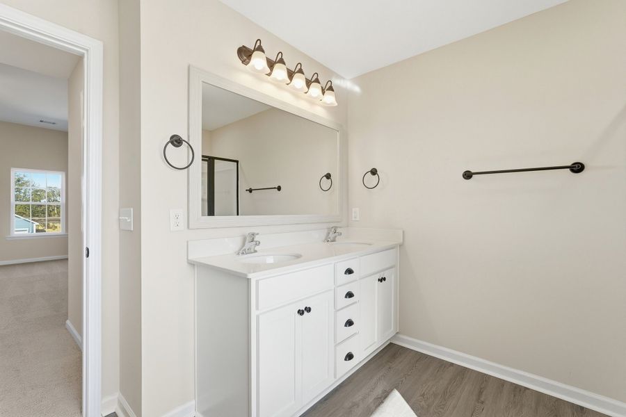 Representative furnished interior of a home built from the The Chatman by RTS Homes in The Gardens at 15 West, Hinesville (Image 17).
