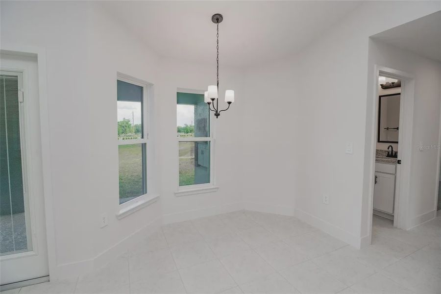 Spacious, unfurnished interior of a new home in Hickory Ridge Estates, Lake Wales (Image 22).