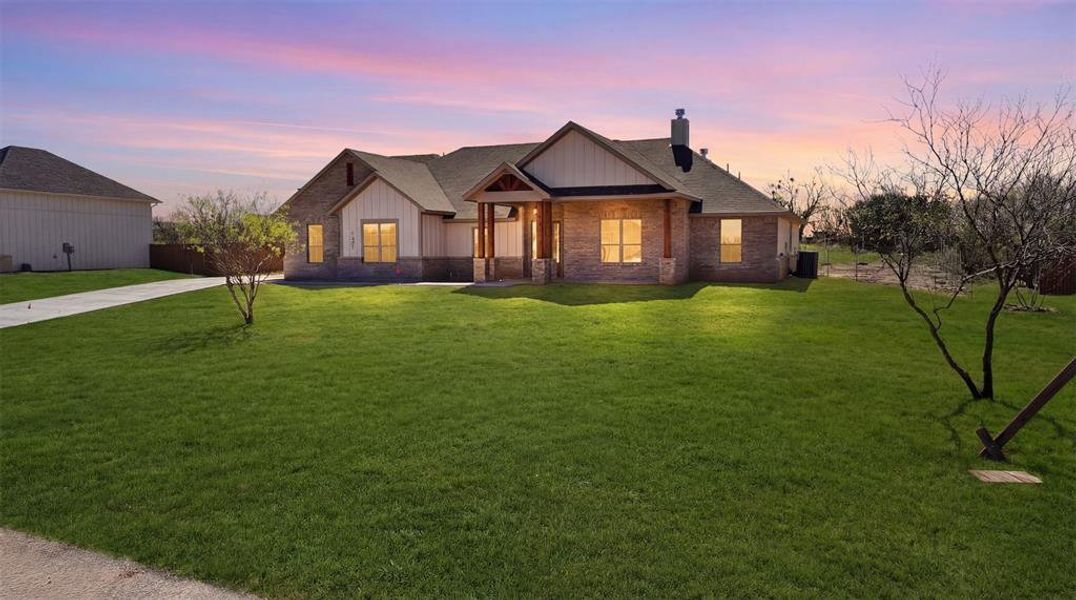 Front exterior of a new home in , Graford, TX, highlighting curb appeal (Image 21).
