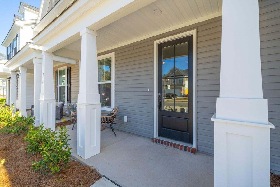 Front exterior of a new home in Abbey Walk, Moncks Corner, SC, highlighting curb appeal (Image 22).