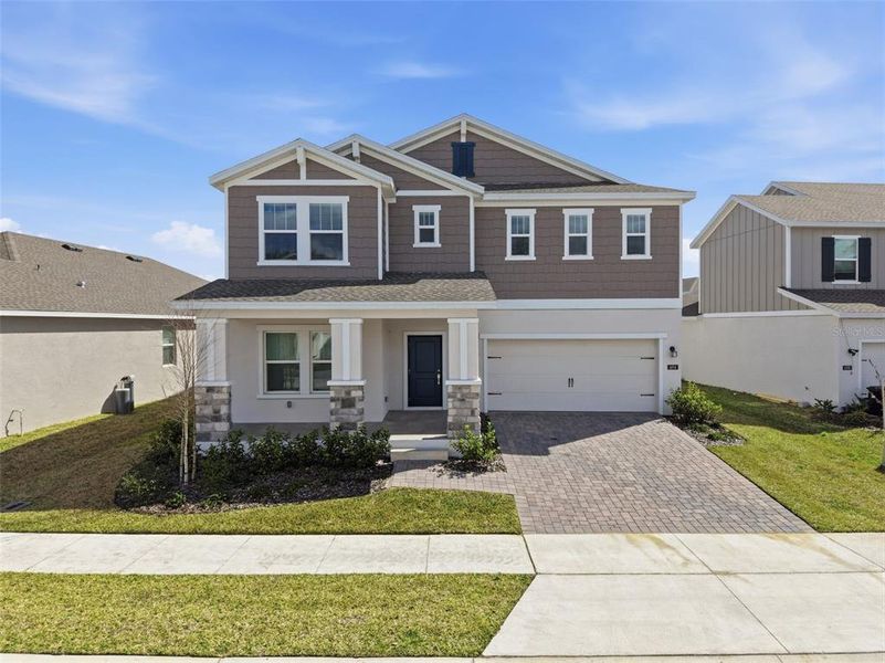 Front exterior of a new home in , Debary, FL, highlighting curb appeal (Image 26).
