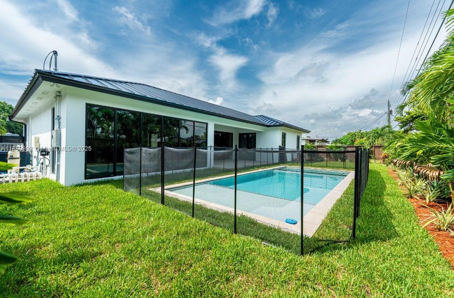 Front exterior of a new home in , Miami, FL, highlighting curb appeal (Image 17).