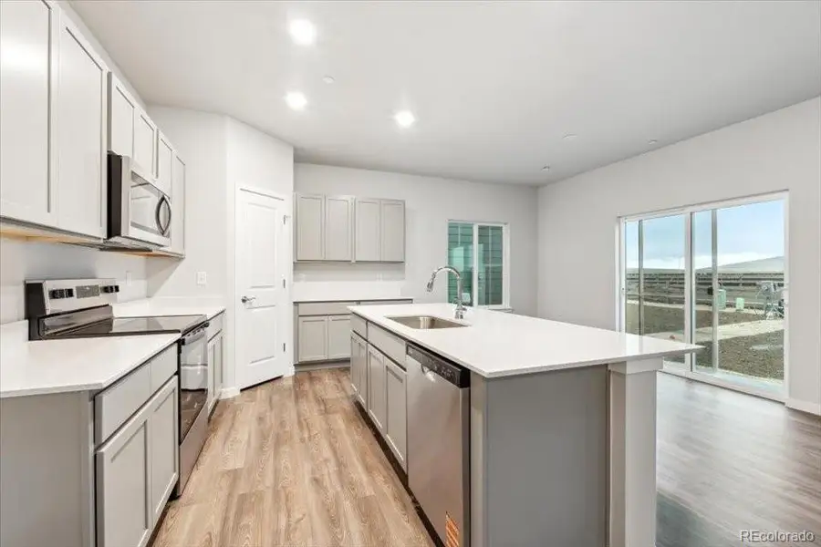 Furnished interior view inside a new home in Legato, Commerce City (Image 10).