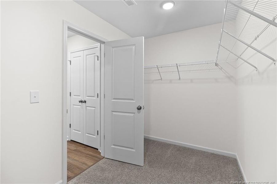 Primary Suite Walk in closet