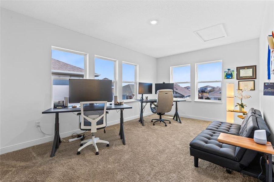 Furnished interior view inside a new home in Laureate Park, Orlando (Image 19).