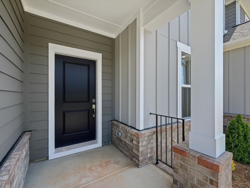 Exterior details and patio area of a home in Hardy Pond Townhomes, Rock Hill (Image 4). Exterior details and patio area of a home in Hardy Pond Townhomes, Rock Hill (Image 4).