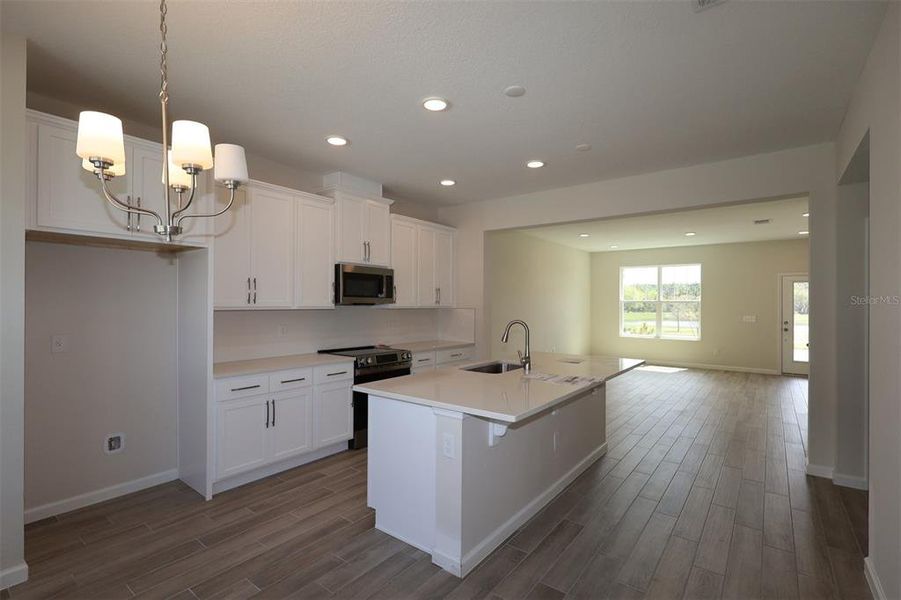 Furnished interior view inside a new home in Center Lake on the Park, St. Cloud (Image 5).