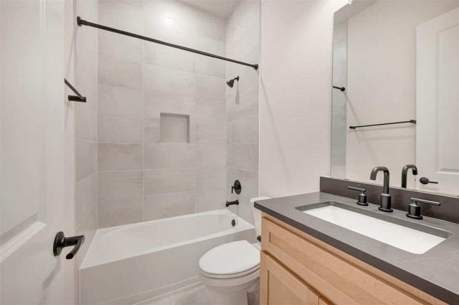 Furnished interior view inside a new home in Harvest Green - Reserve Collection, Richmond (Image 4).