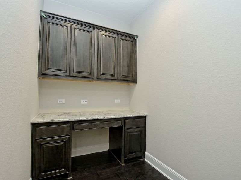 Representative furnished interior of a home built from the Madera II by Giddens Homes in Scofield Farms Estates, Georgetown (Image 198).