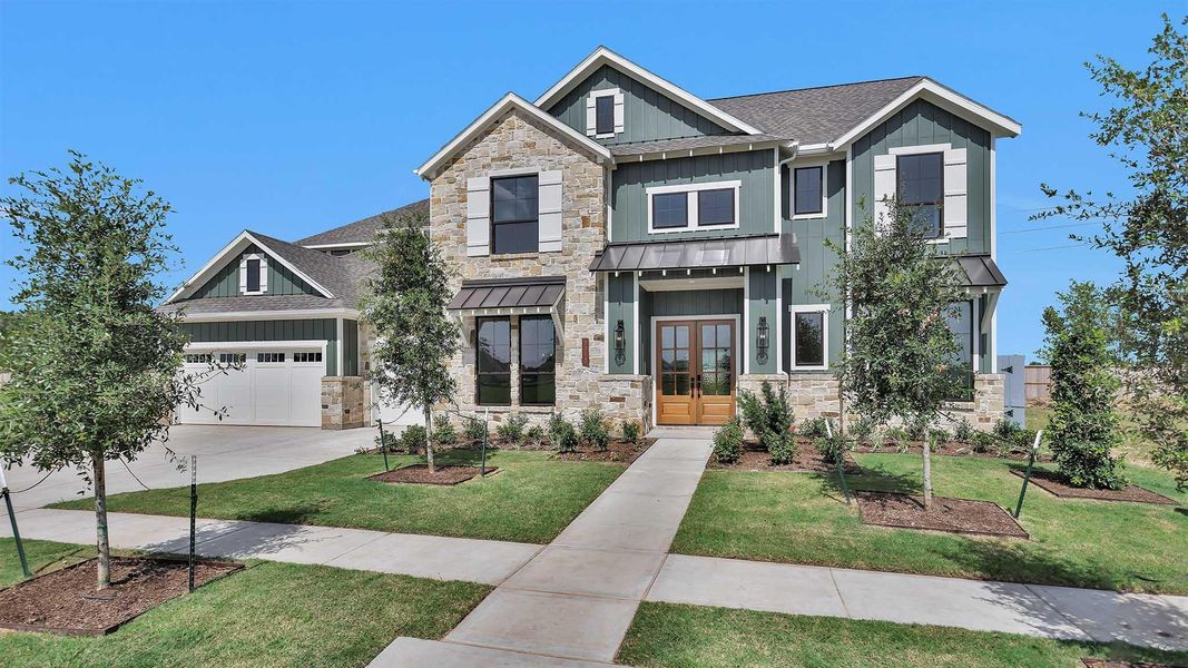 Front exterior of a new home in Fulshear Lakes 80', Fulshear, TX, highlighting curb appeal (Image 12).