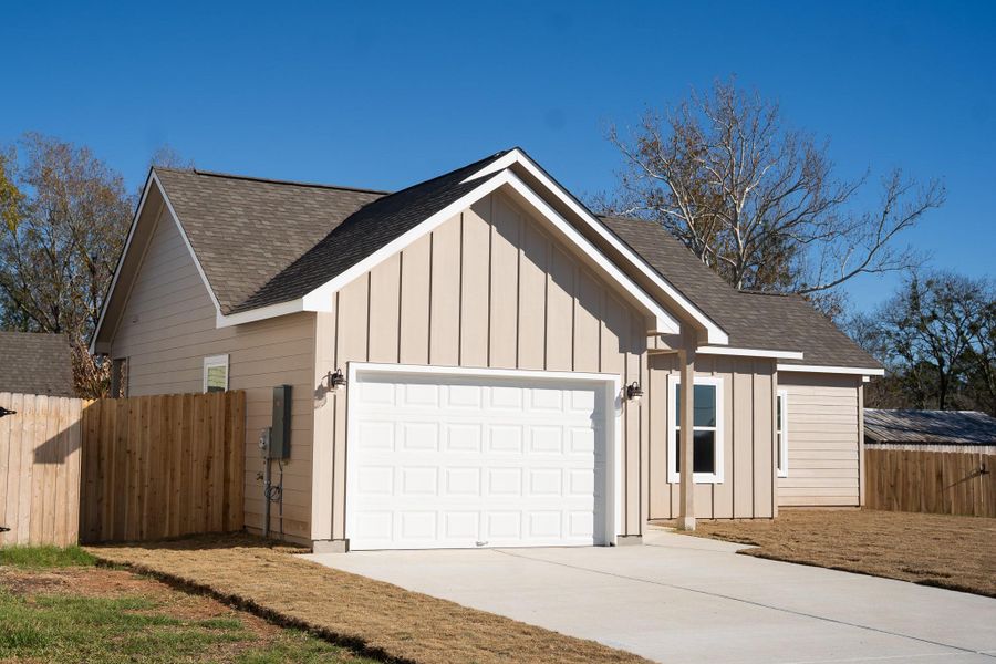 Front exterior of a new home in , Smithville, TX, highlighting curb appeal (Image 2). Front exterior of a new home in , Smithville, TX, highlighting curb appeal (Image 2).
