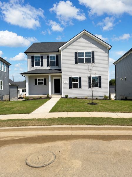 Front exterior of a new home in Hobson Park, Antioch, TN, highlighting curb appeal (Image 1). Front exterior of a new home in Hobson Park, Antioch, TN, highlighting curb appeal (Image 1).