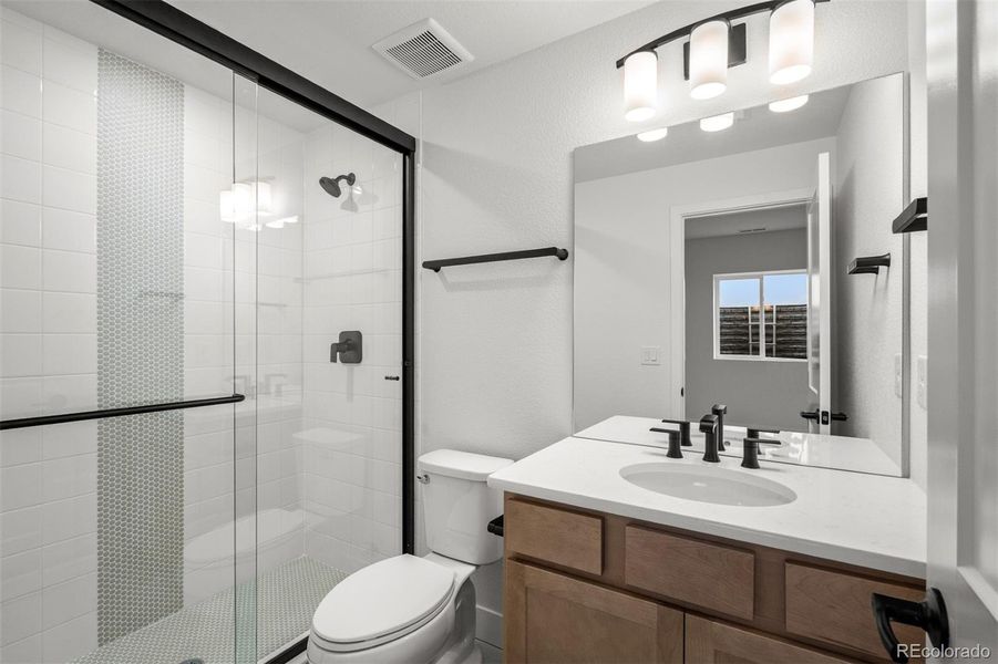 Furnished interior view inside a new home in Wolf Ranch - Enclave Collection, Colorado Springs (Image 15).